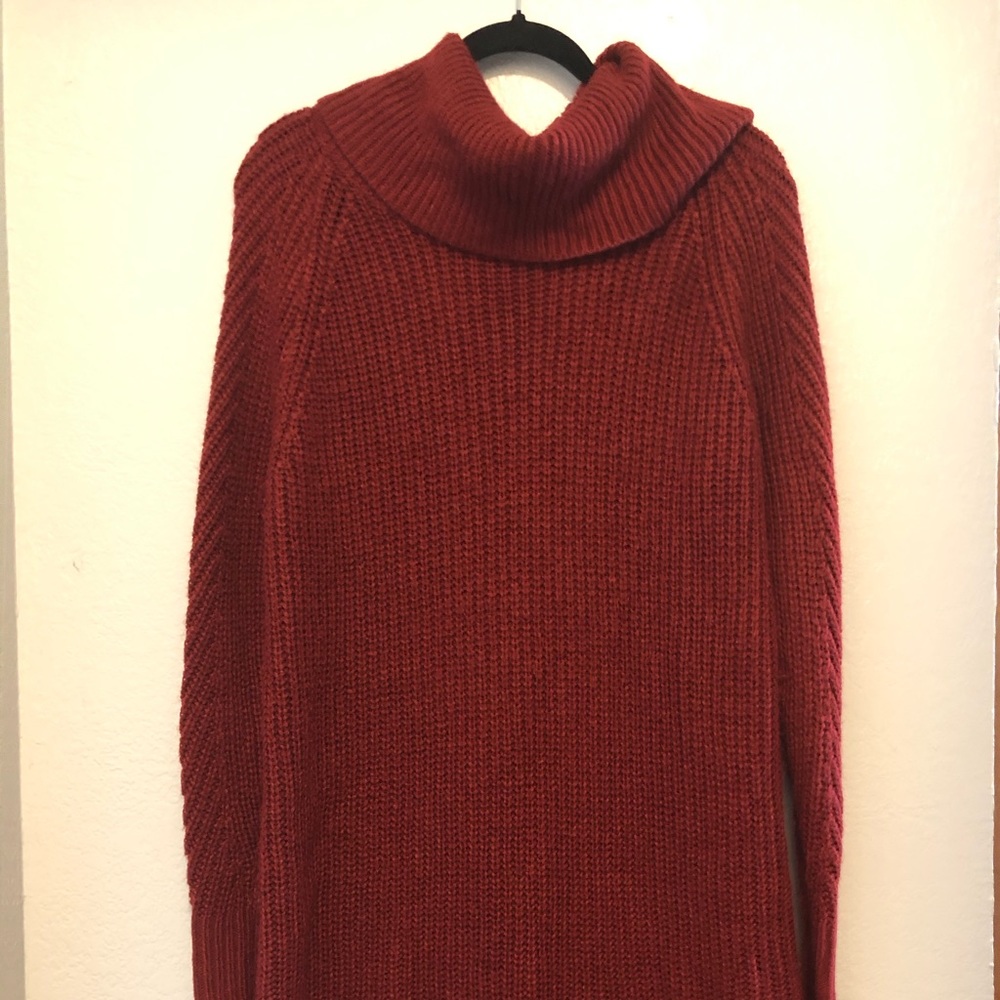 Long, oversized burnt orange turtleneck